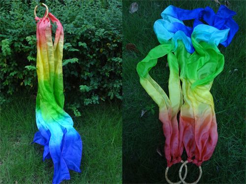 Cometa de mano para niños danza y juegan rojo-amarillo-verde-cian-azul